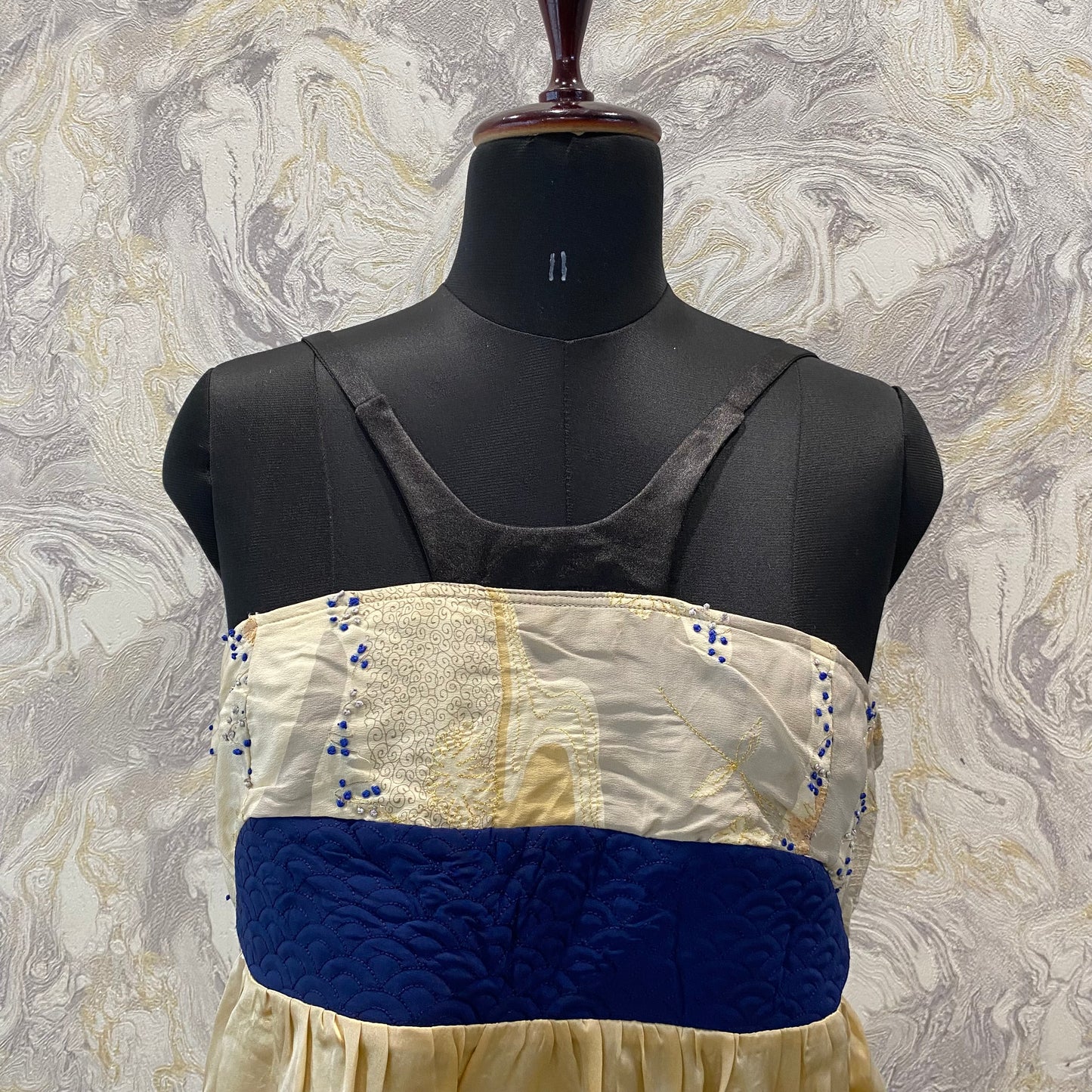 Artsy top with knot embroidery