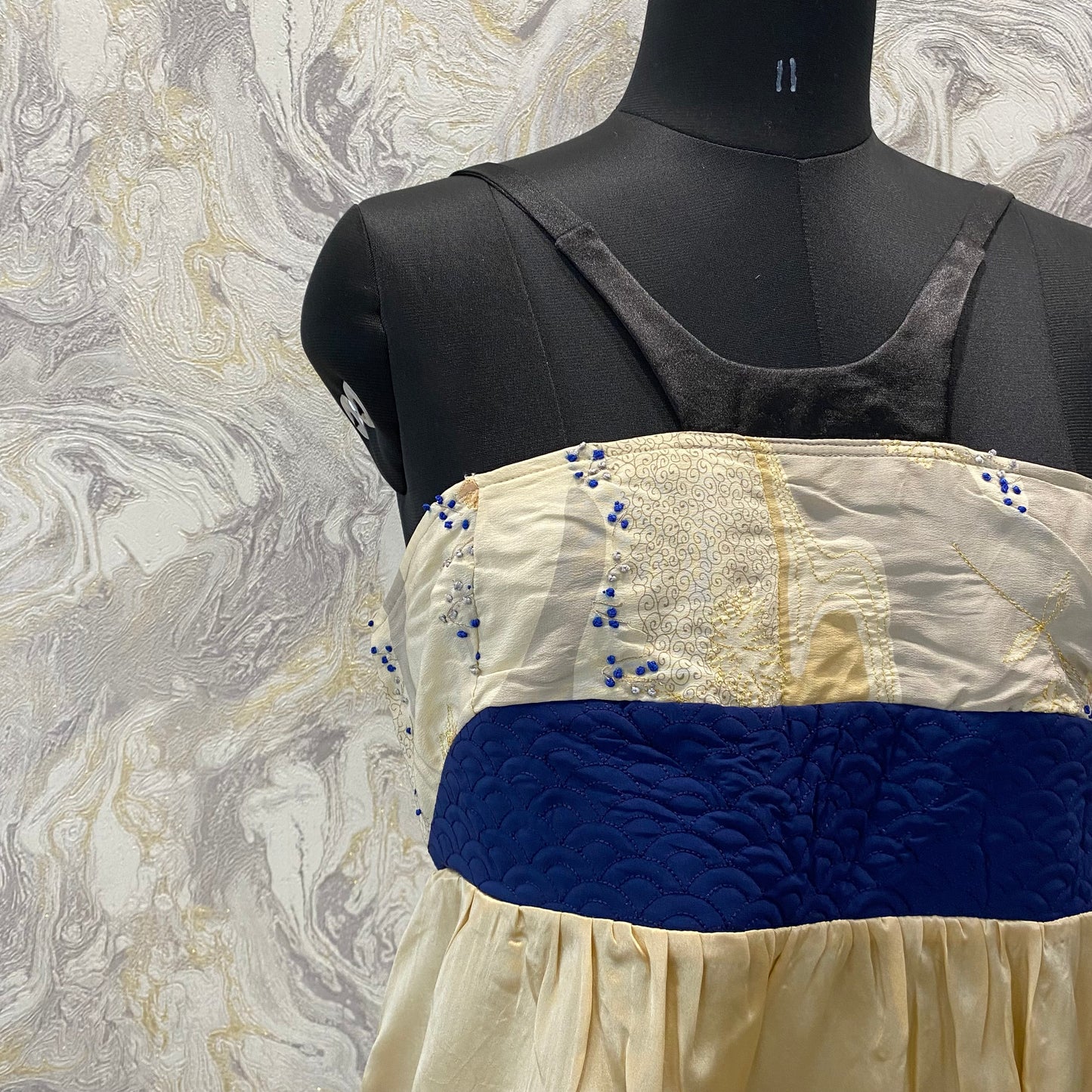 Artsy top with knot embroidery