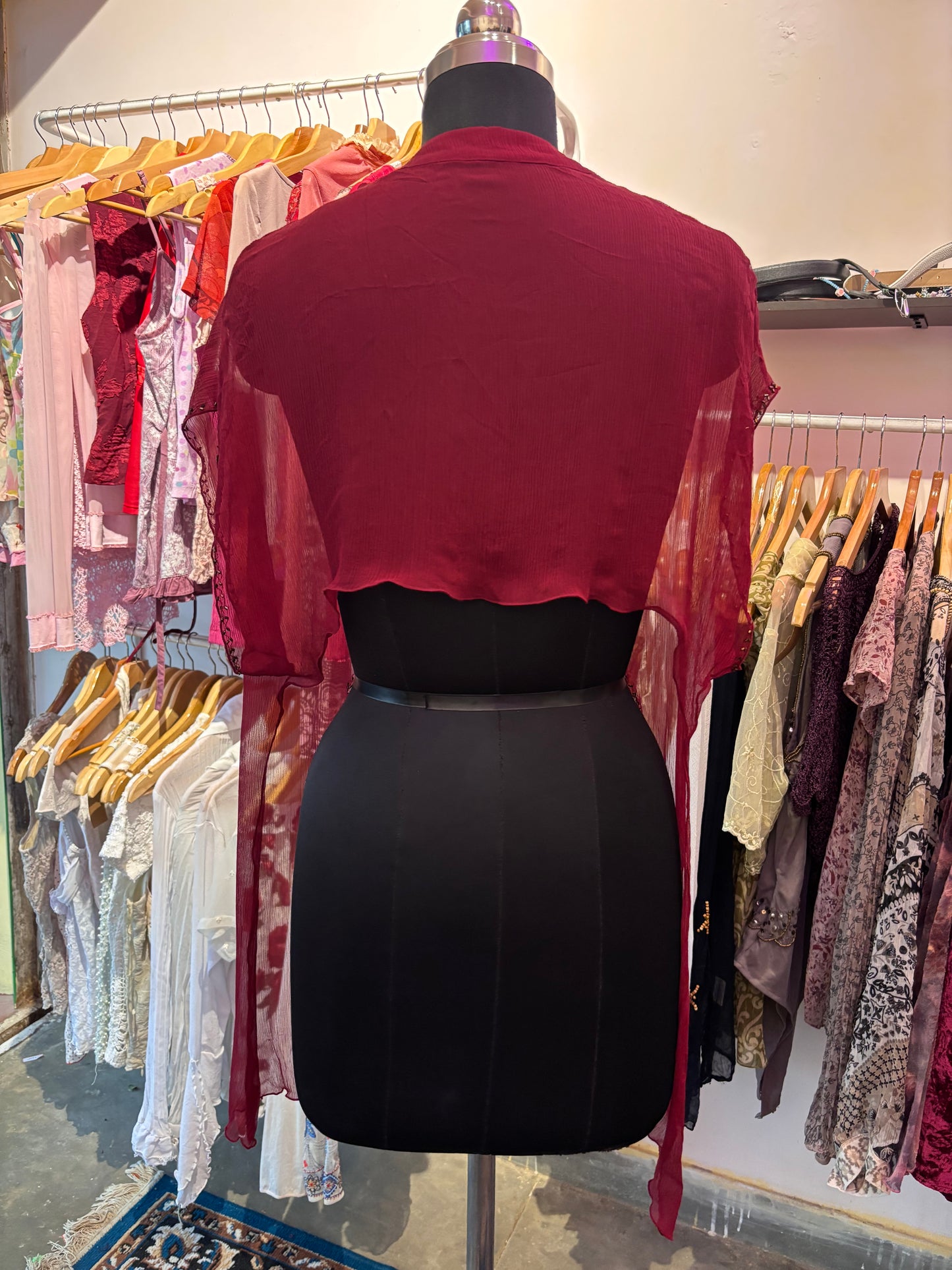 Red silk overwear with bead details
