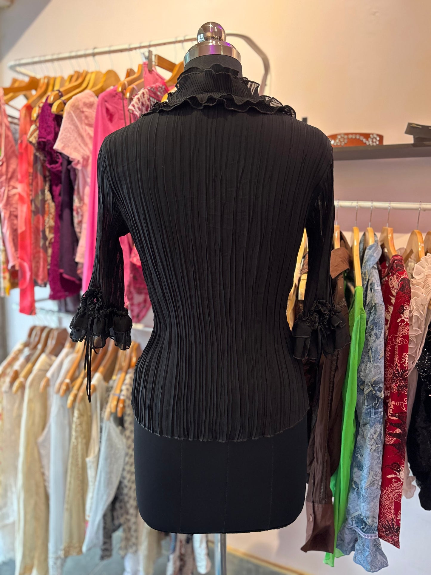 Black ruffle shirt