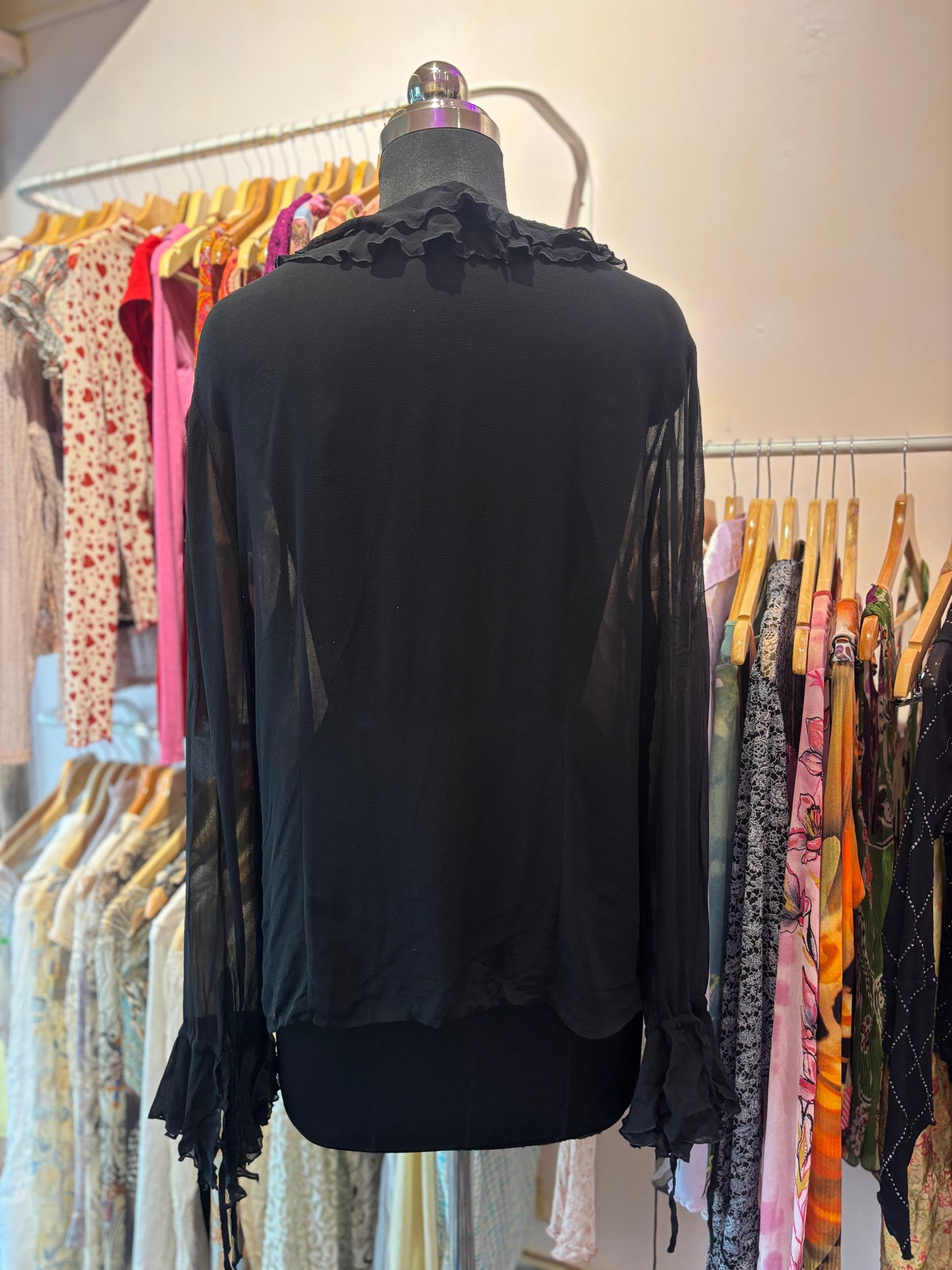Black ruffle neck