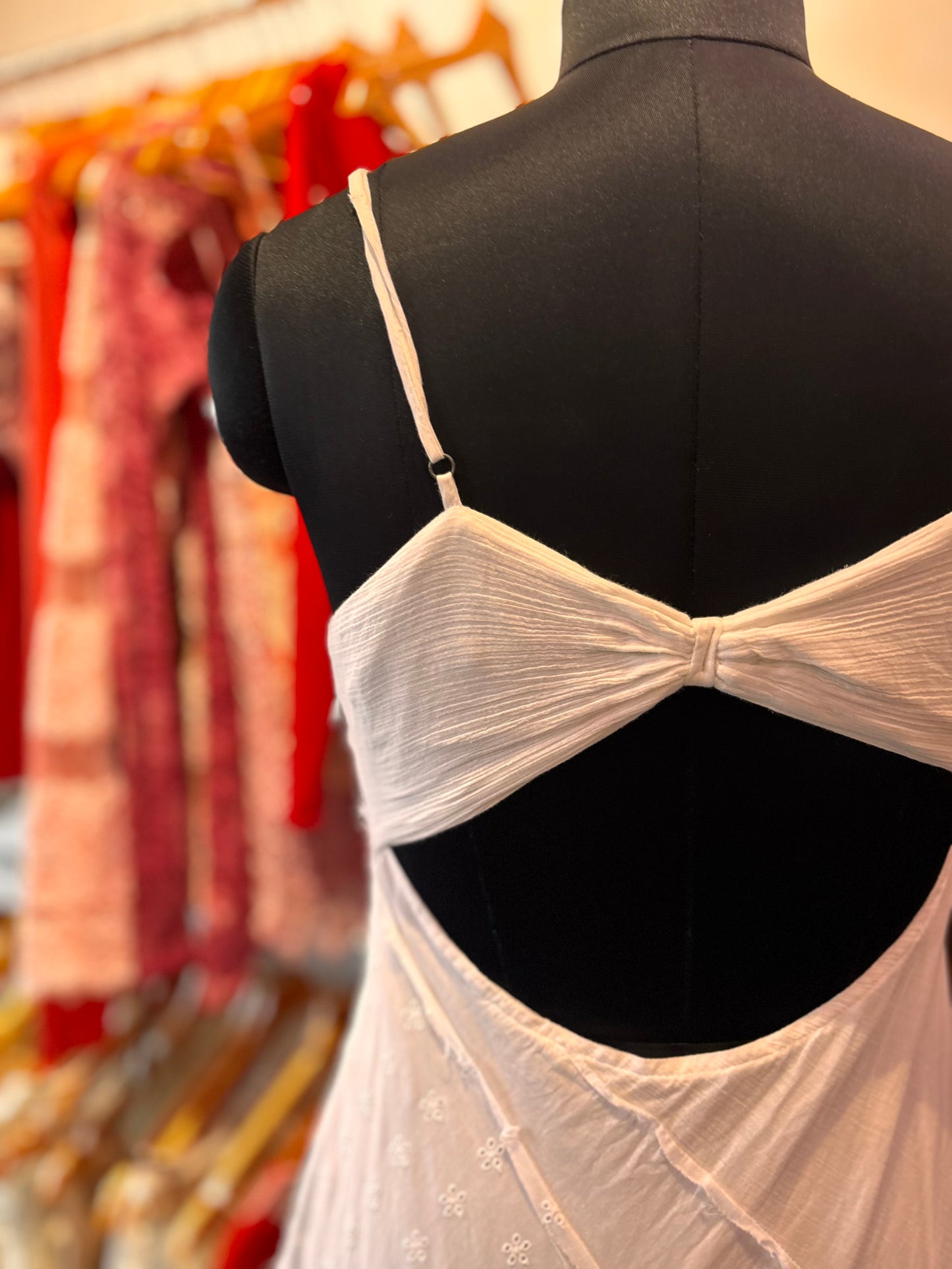 White asymmetrical dress with embroidery