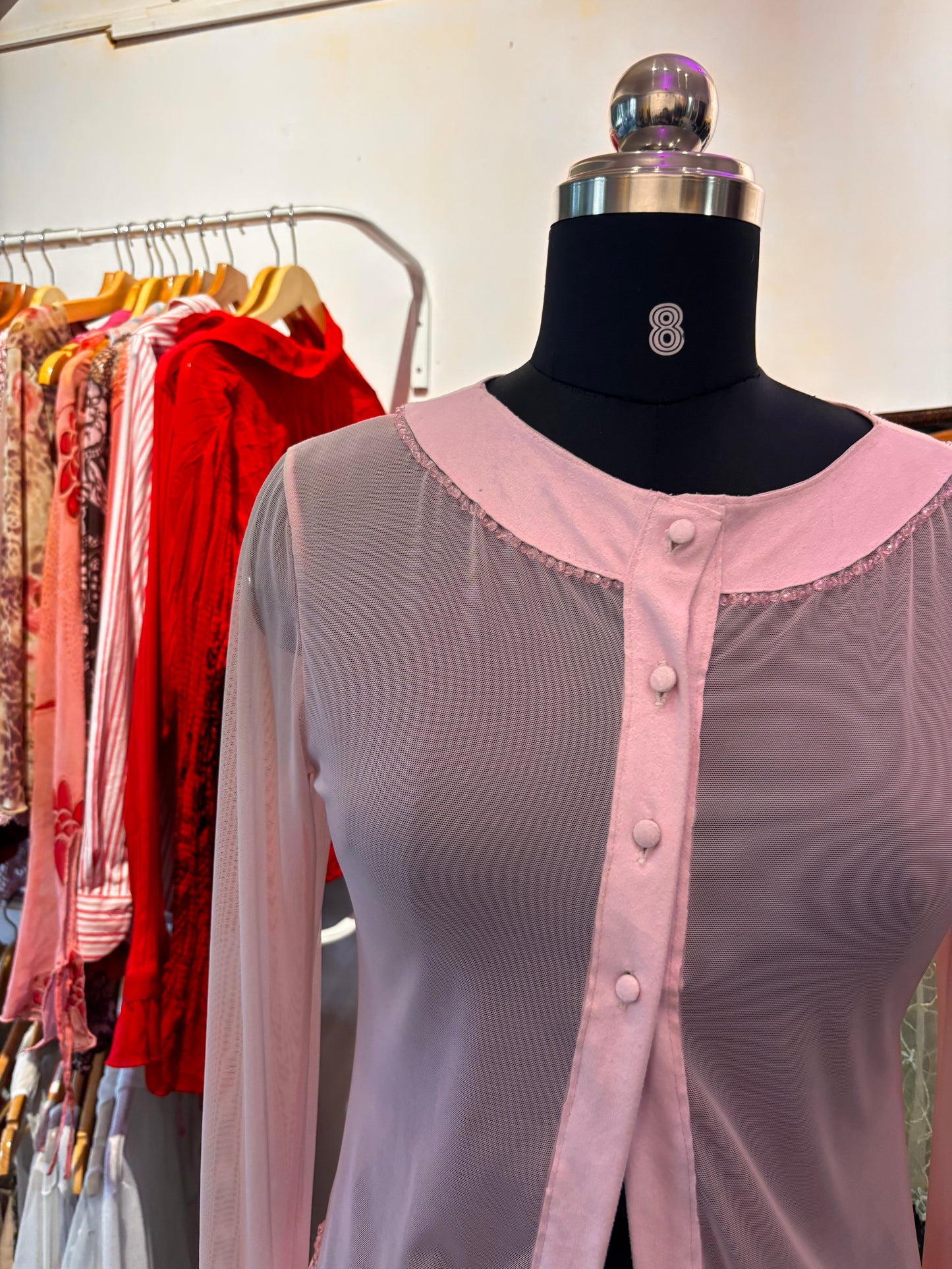 Diana’s pink top