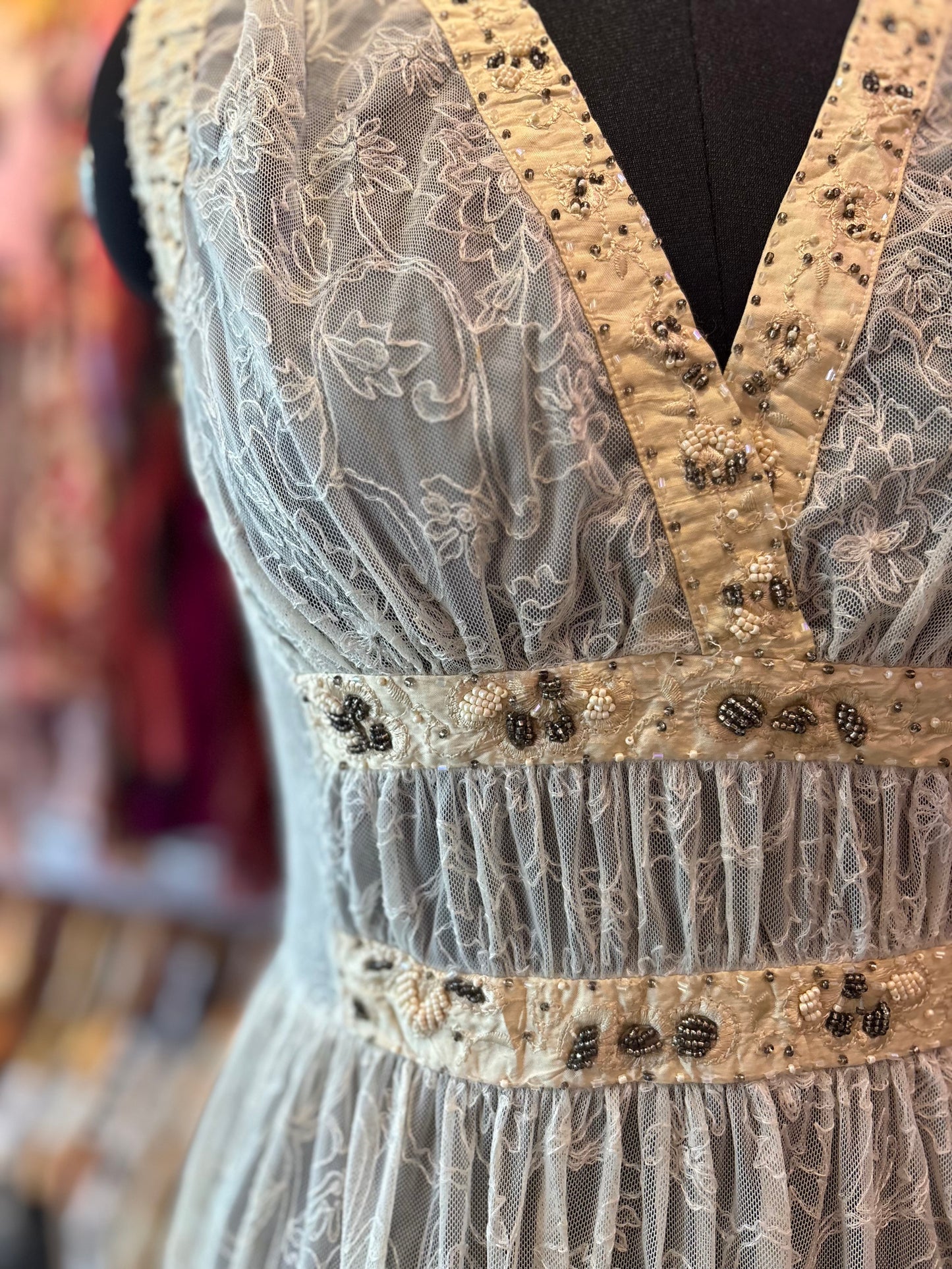 Timeless lacy dress with pearl and bead work