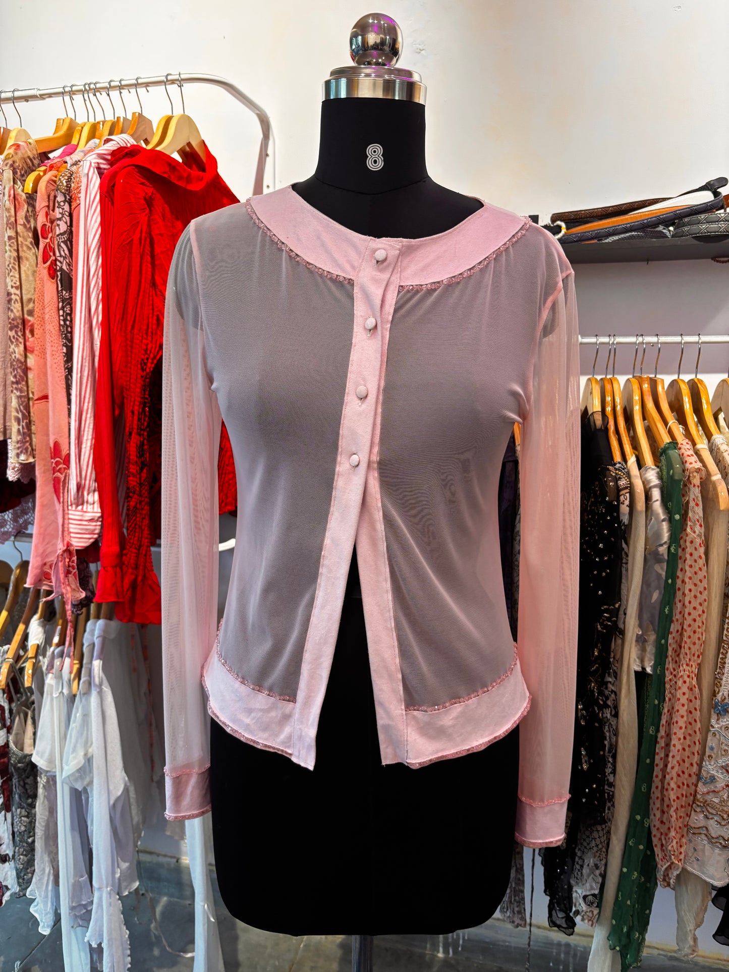 Diana’s pink top