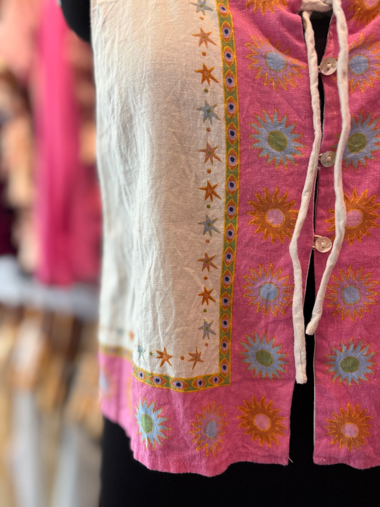 Bloom top with front strings and buttons