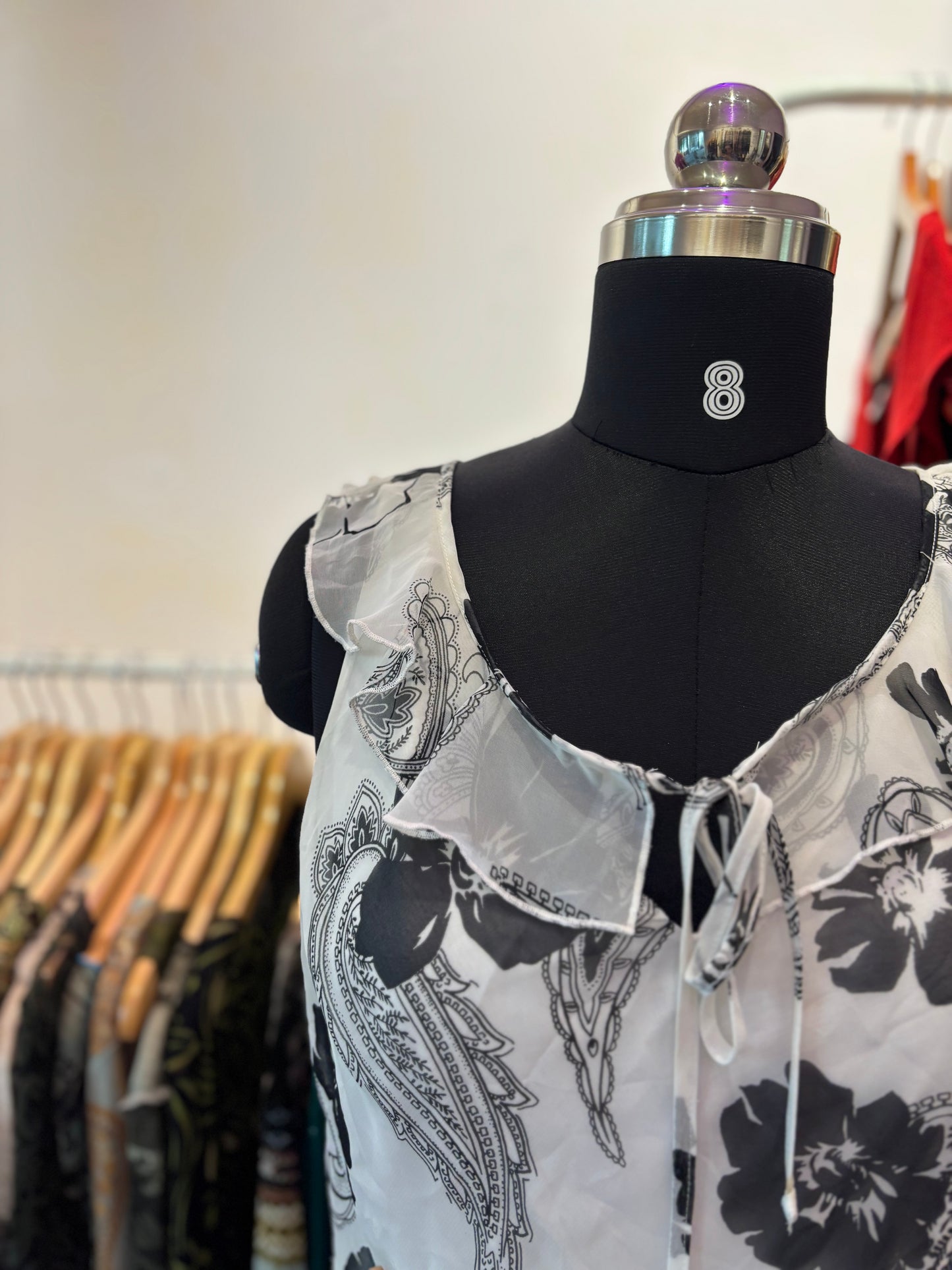 Ruffle neck paisley top
