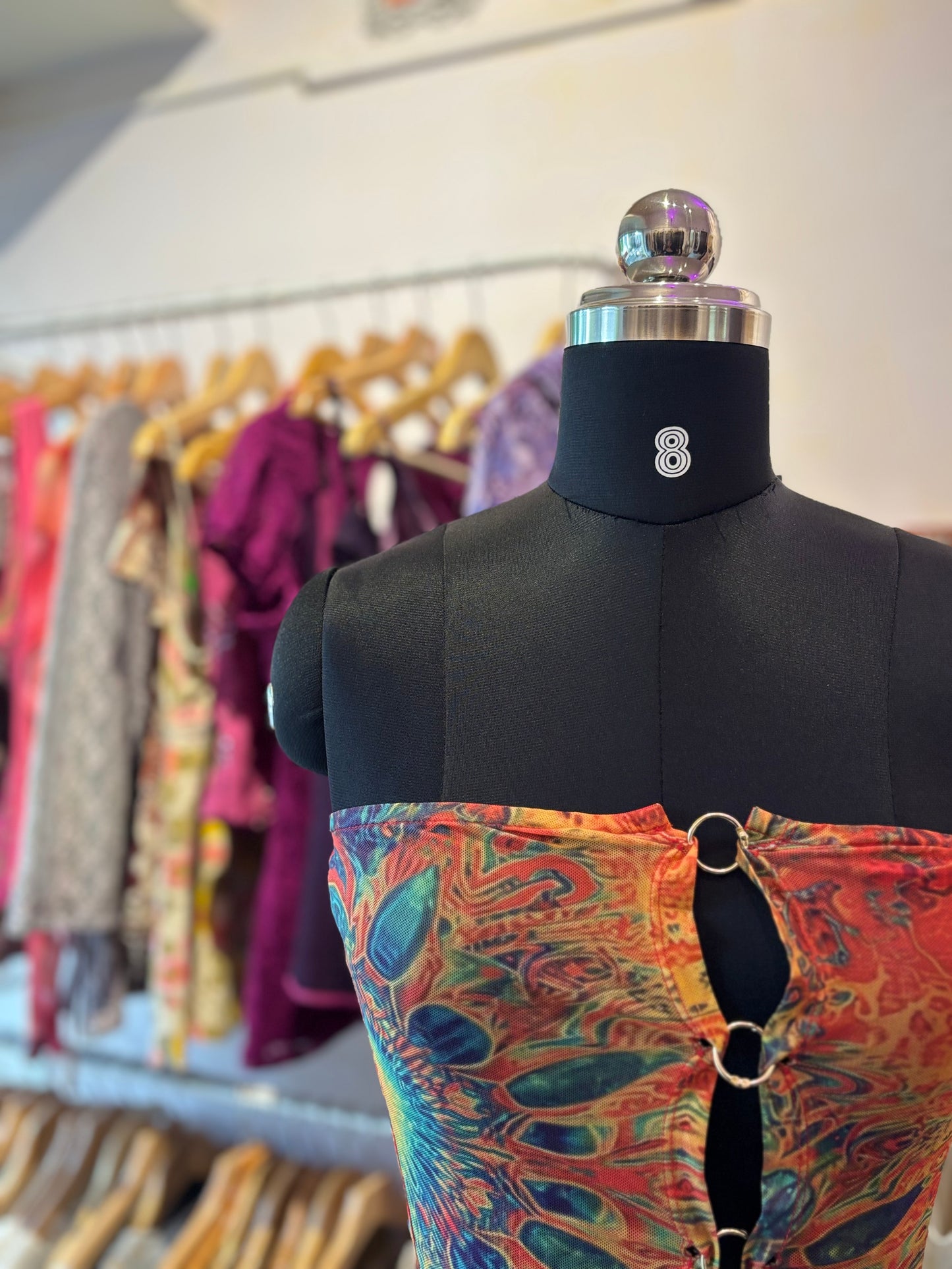 Psychedelic top with metal loops
