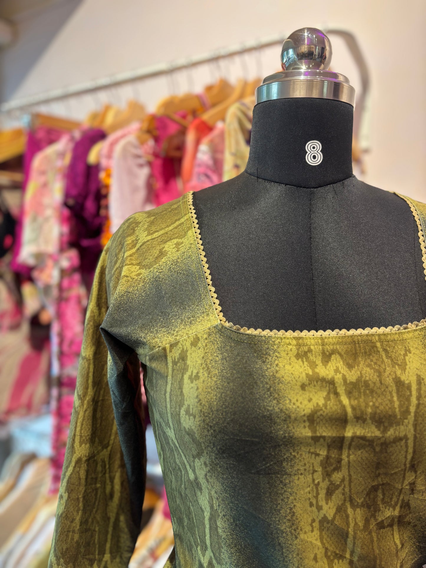 Snake print top with lacy neck