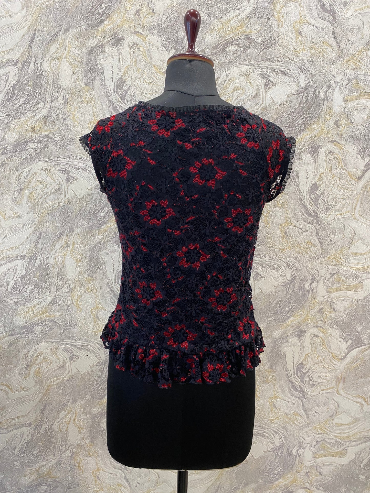 Red and black lacy top with hooks