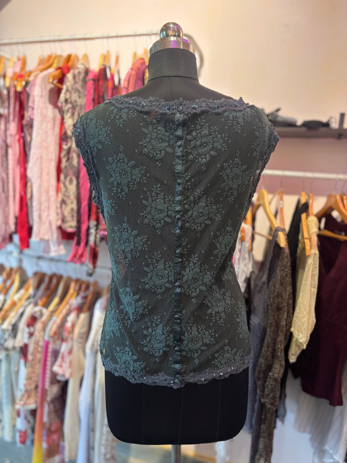 Deep green lace top with sequins details