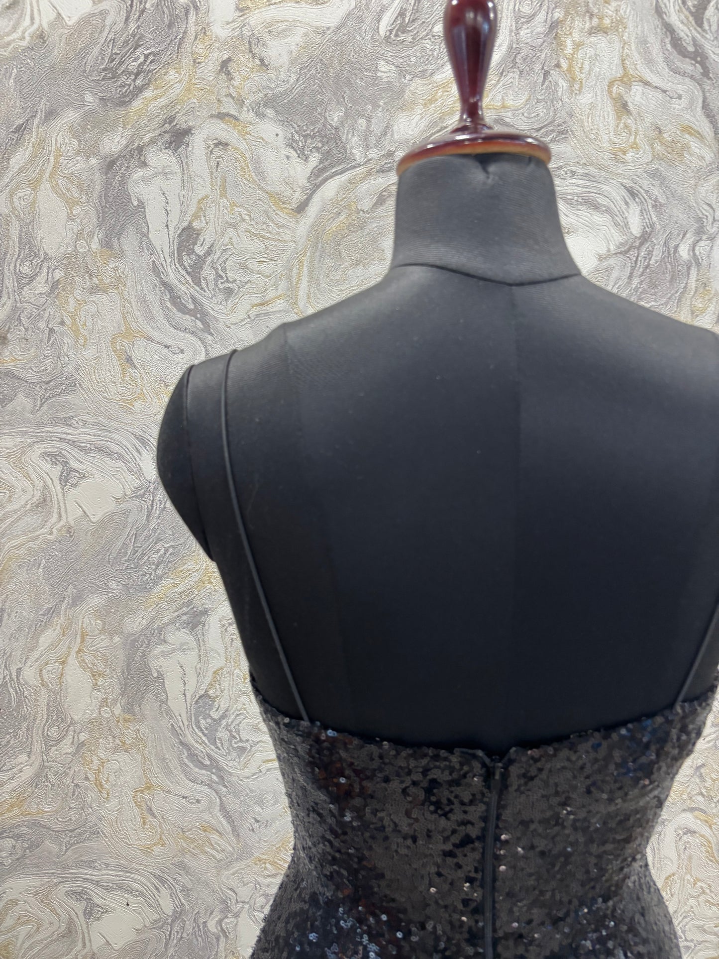Iconic black sequins dress