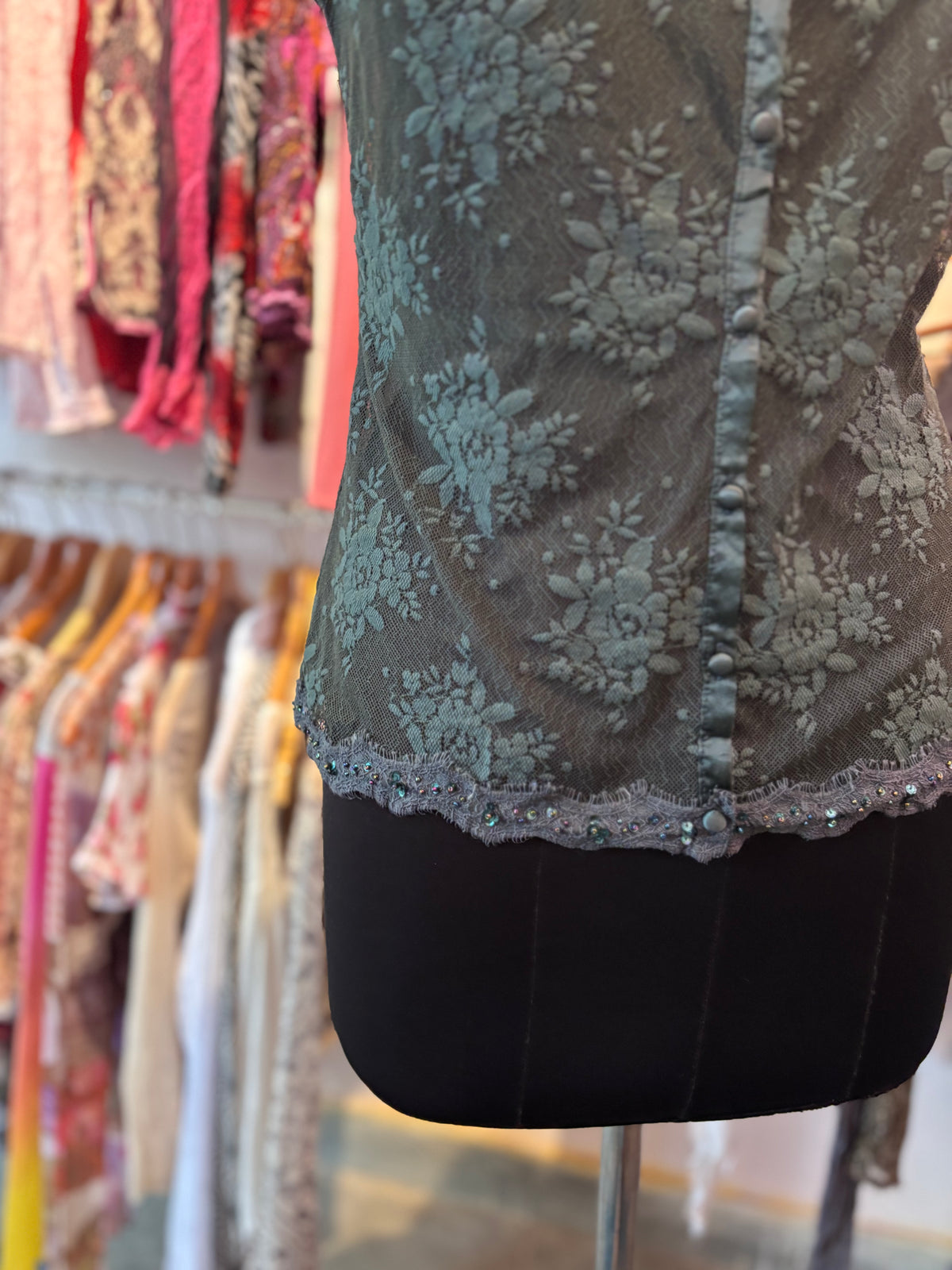 Deep green lace top with sequins details