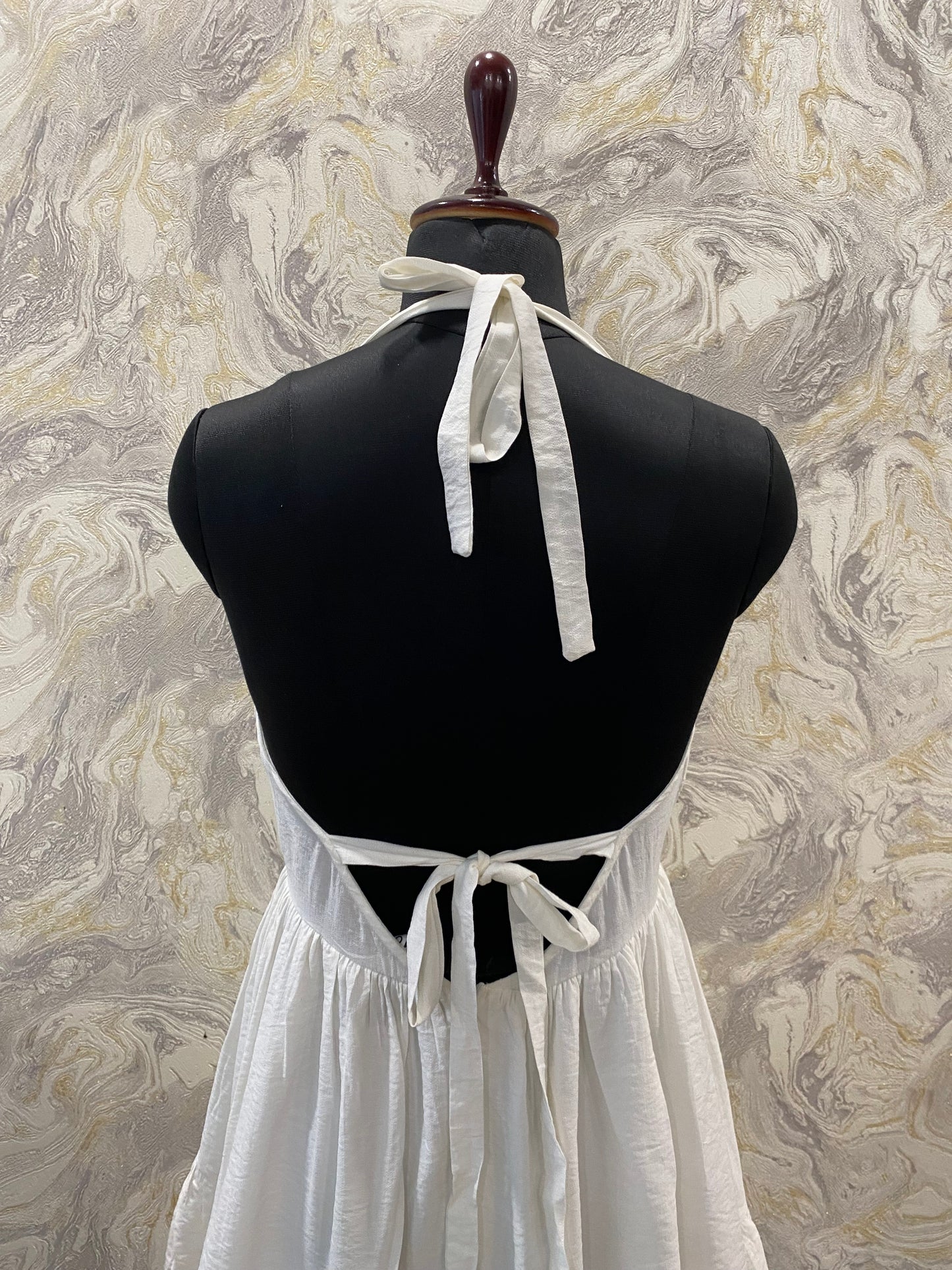 Timeless white halter neck dress