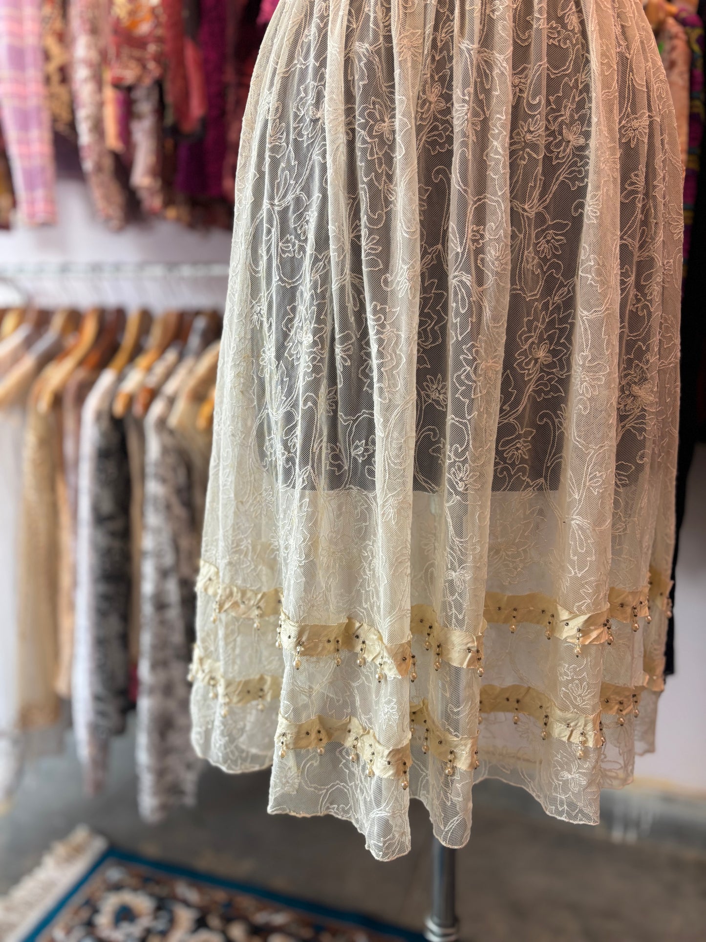 Timeless lacy dress with pearl and bead work