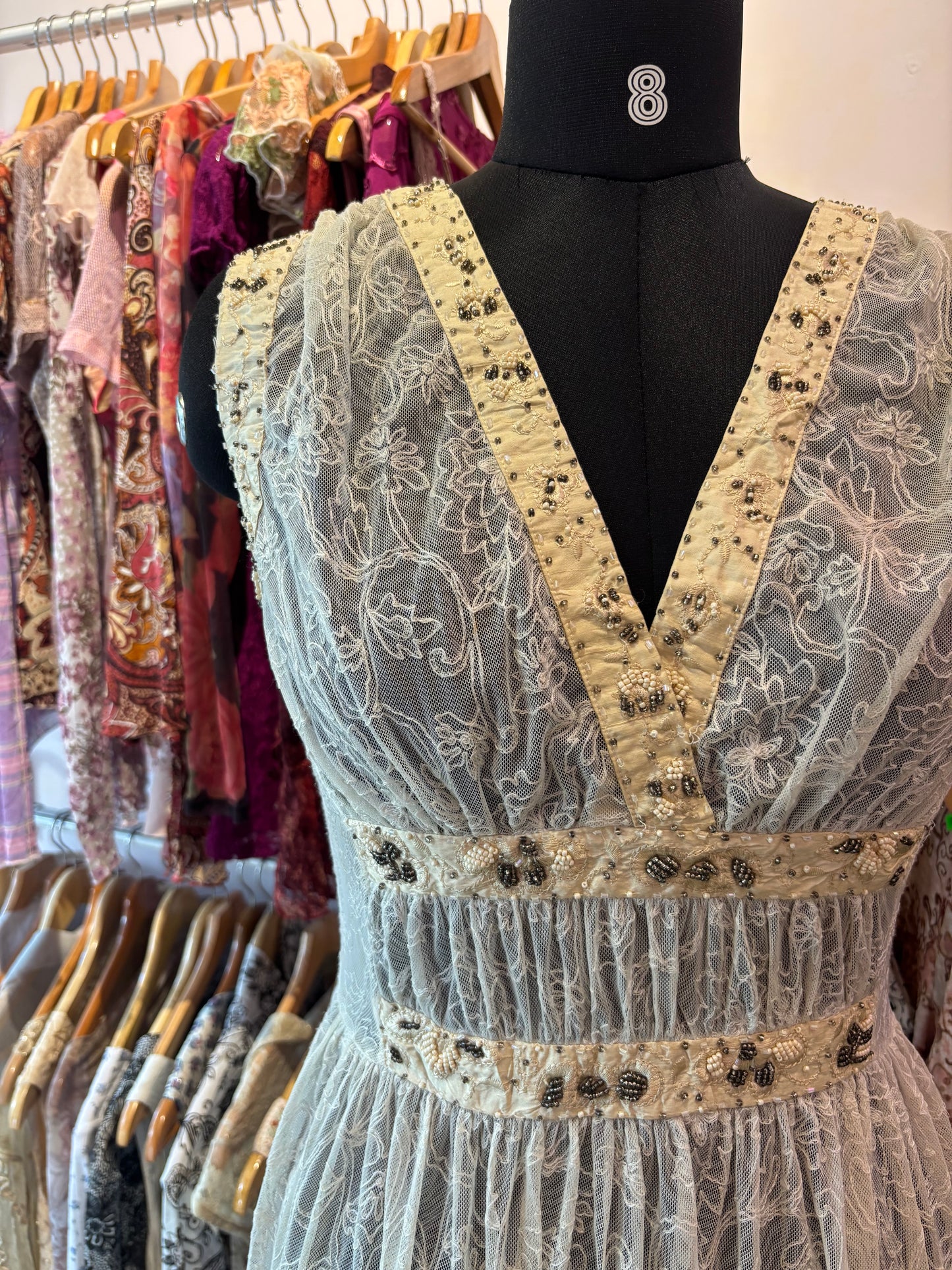 Timeless lacy dress with pearl and bead work