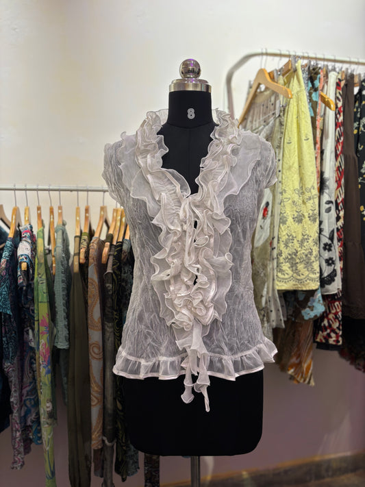 White ruffle neck top