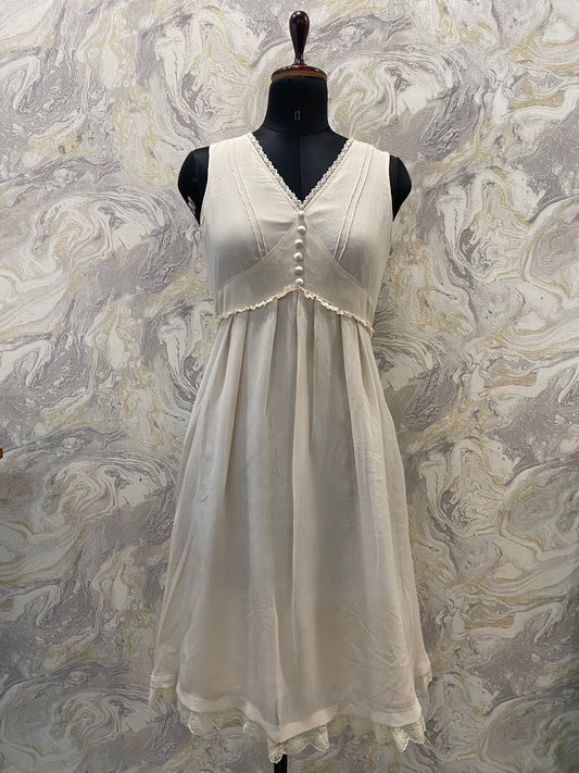 Timeless off white dress with pearl buttons