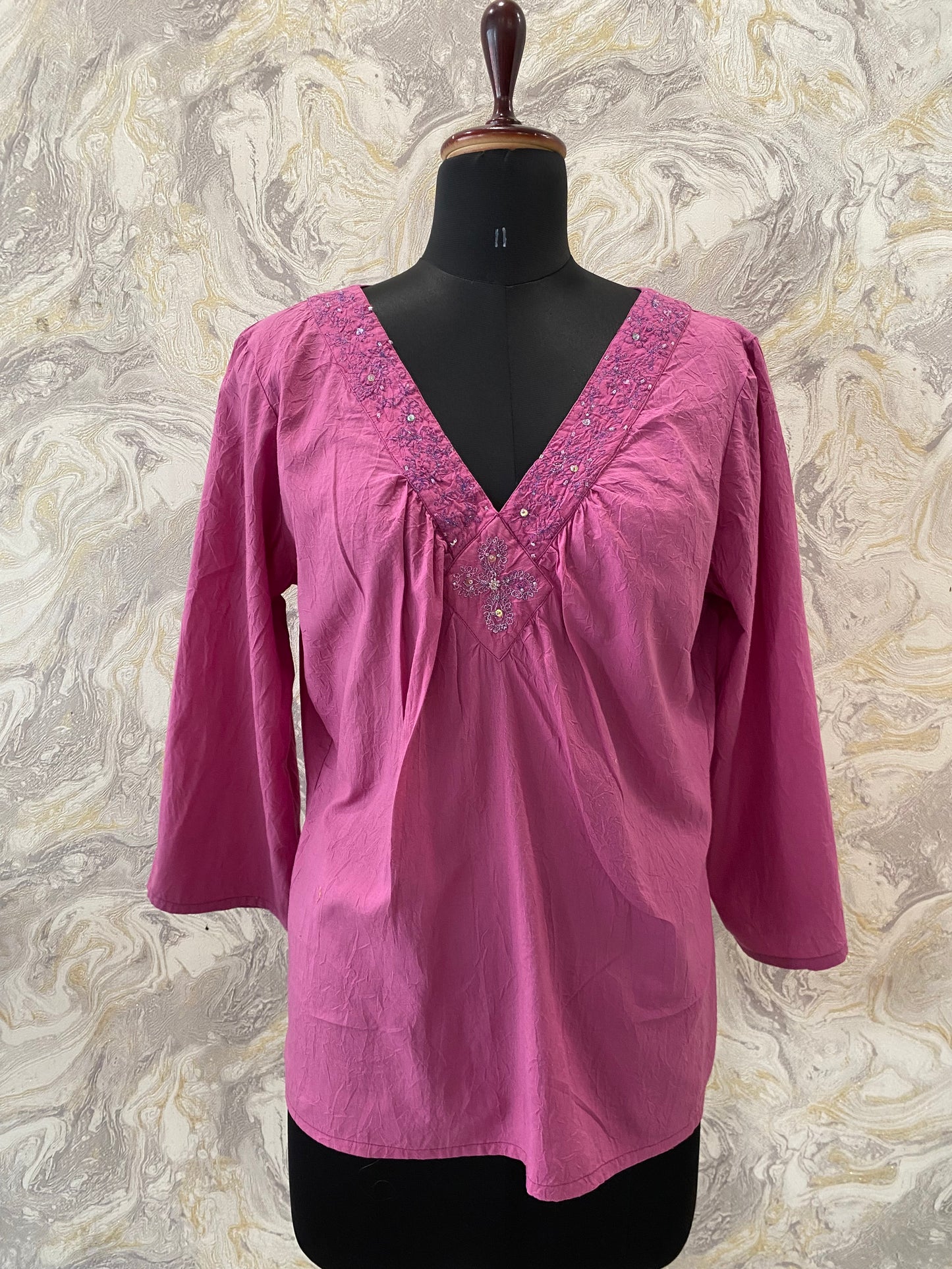 Pink worked neckline