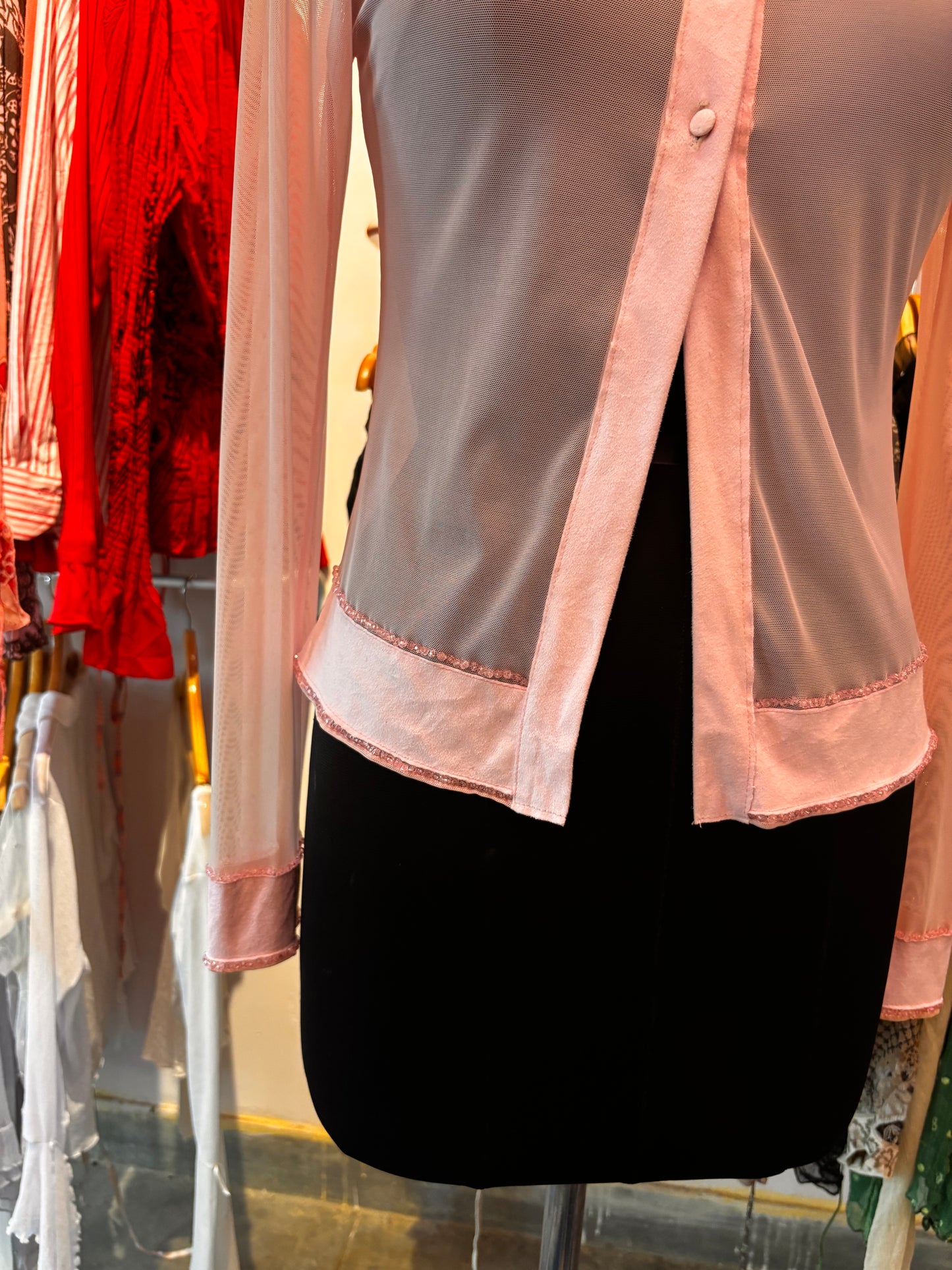Diana’s pink top