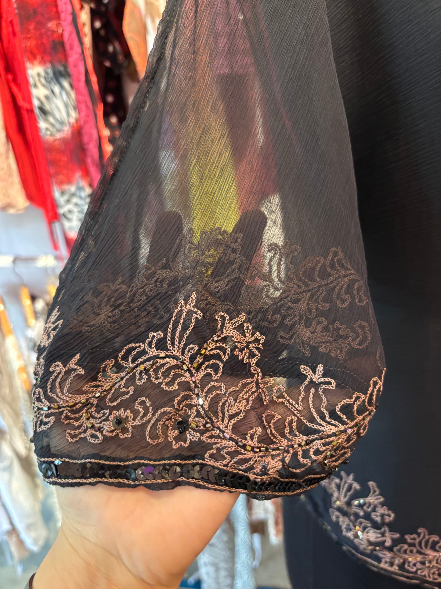 100 percent silk assymetrical top with bead and thread work