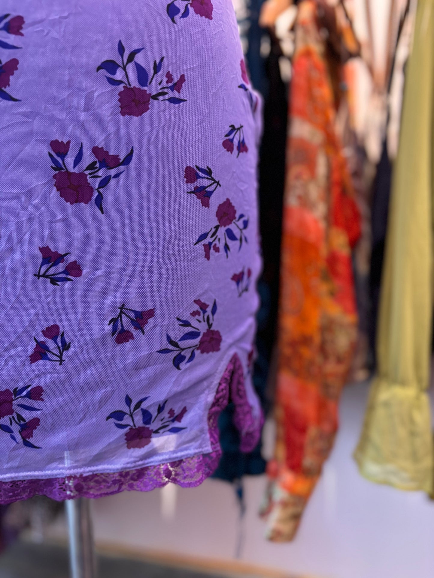 Purple floral dress with lacy neckline