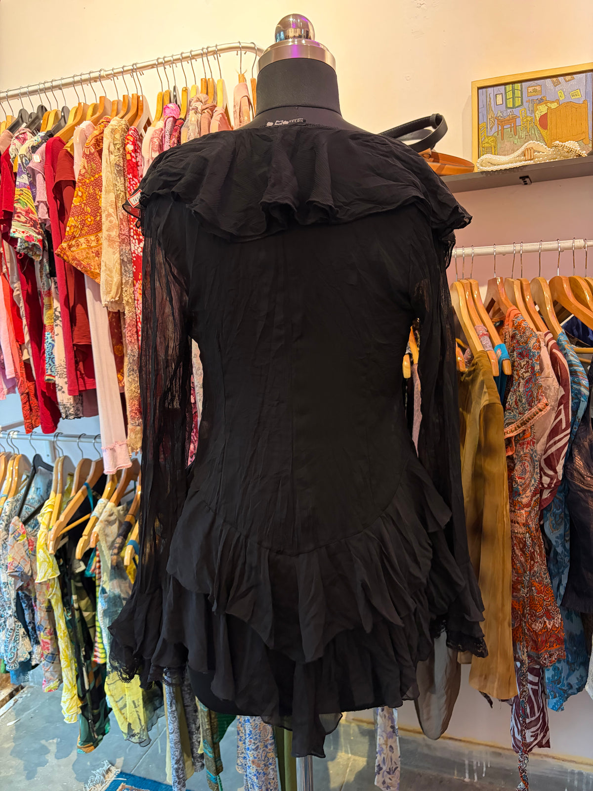 Black ruffles with strings in between