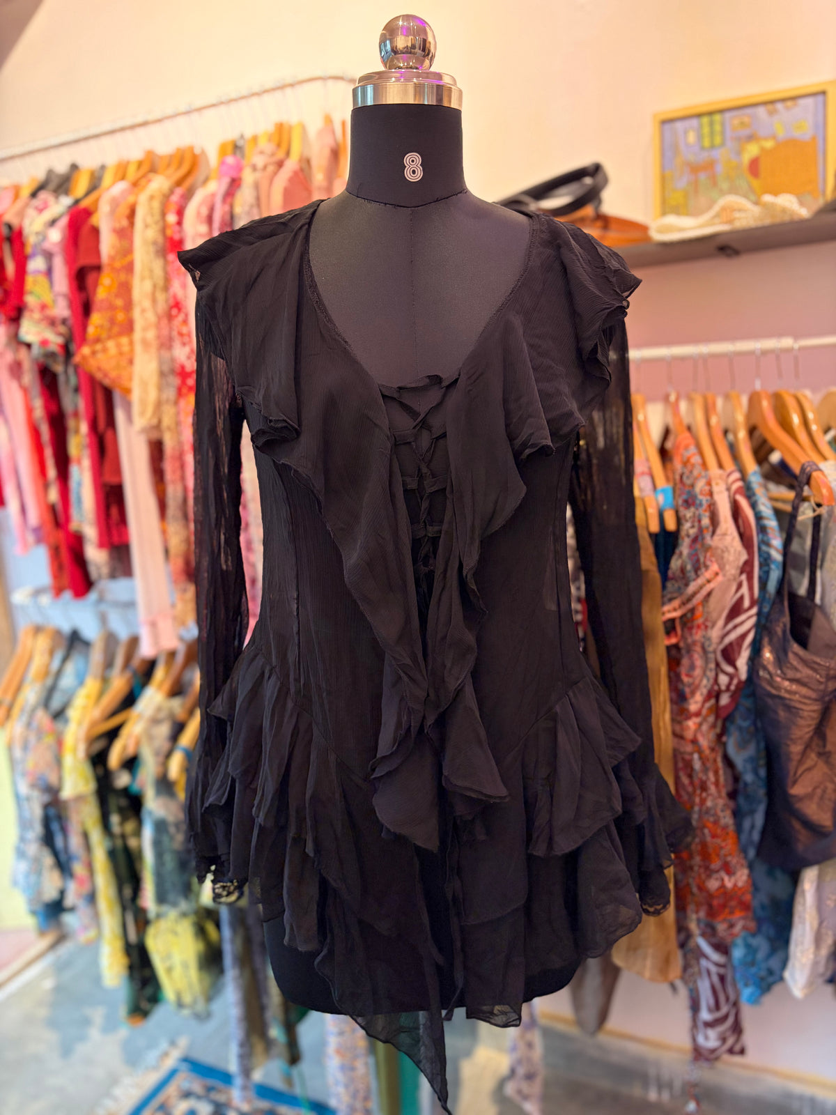 Black ruffles with strings in between