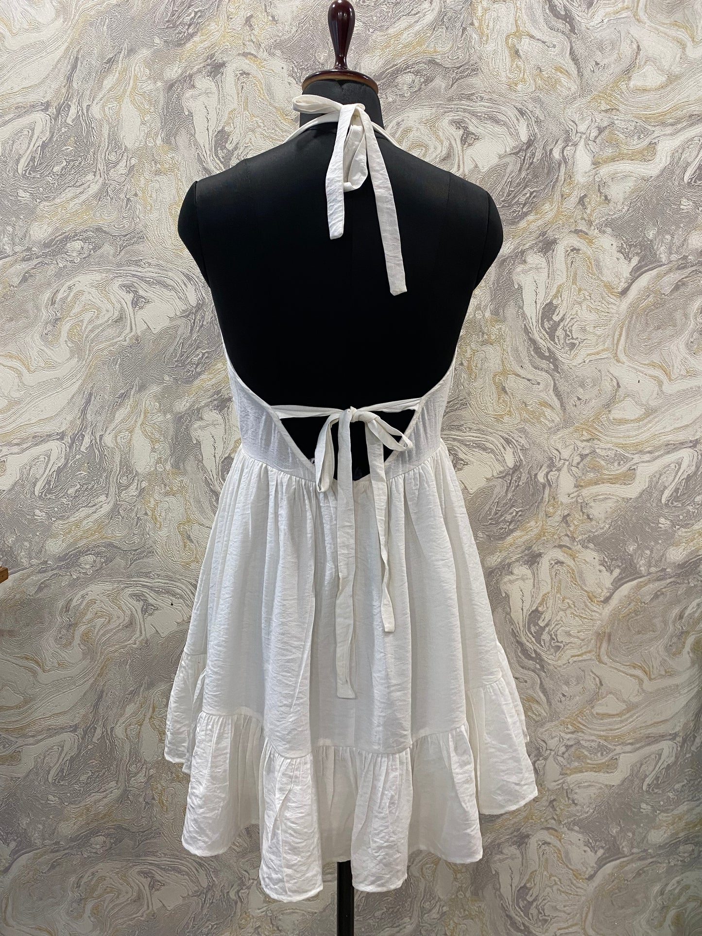 Timeless white halter neck dress