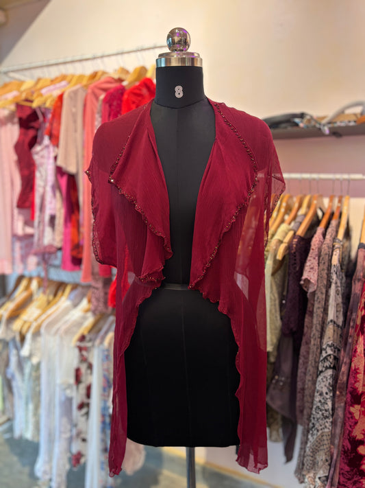 Red silk overwear with bead details