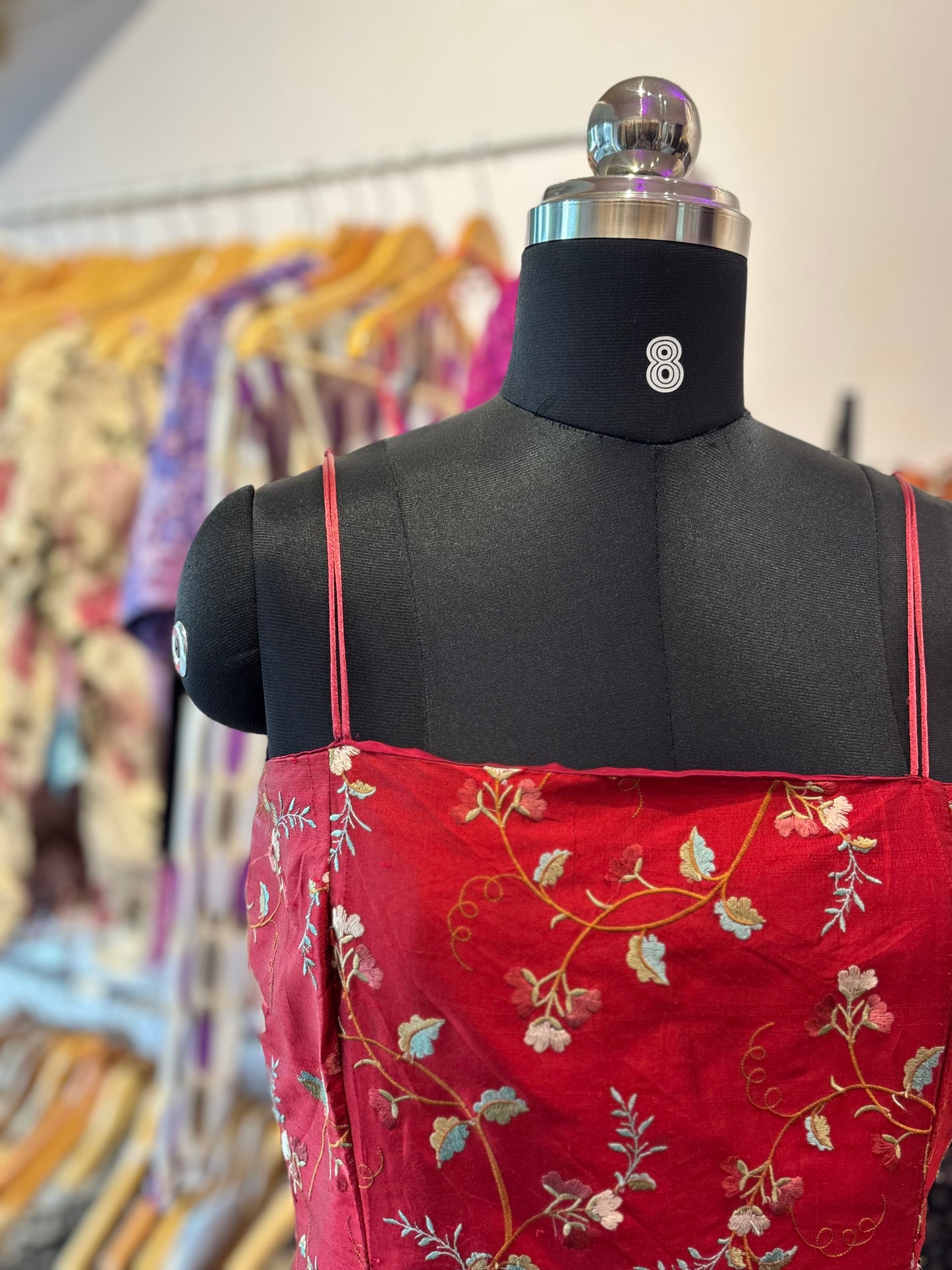 Red embroidered corset like top