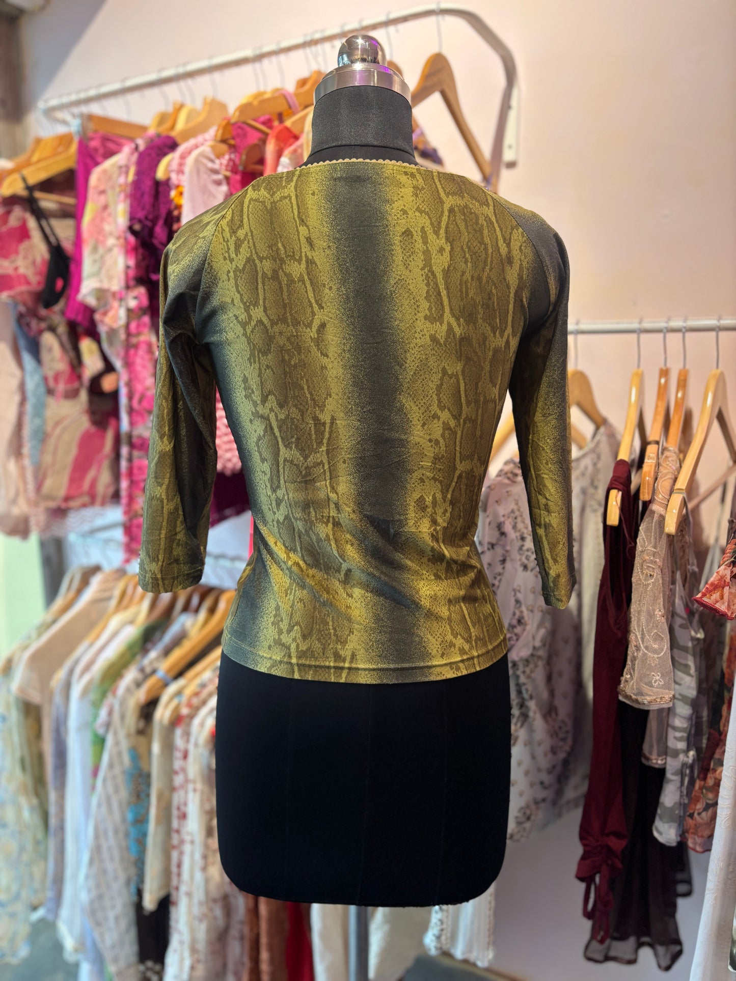 Snake print top with lacy neck