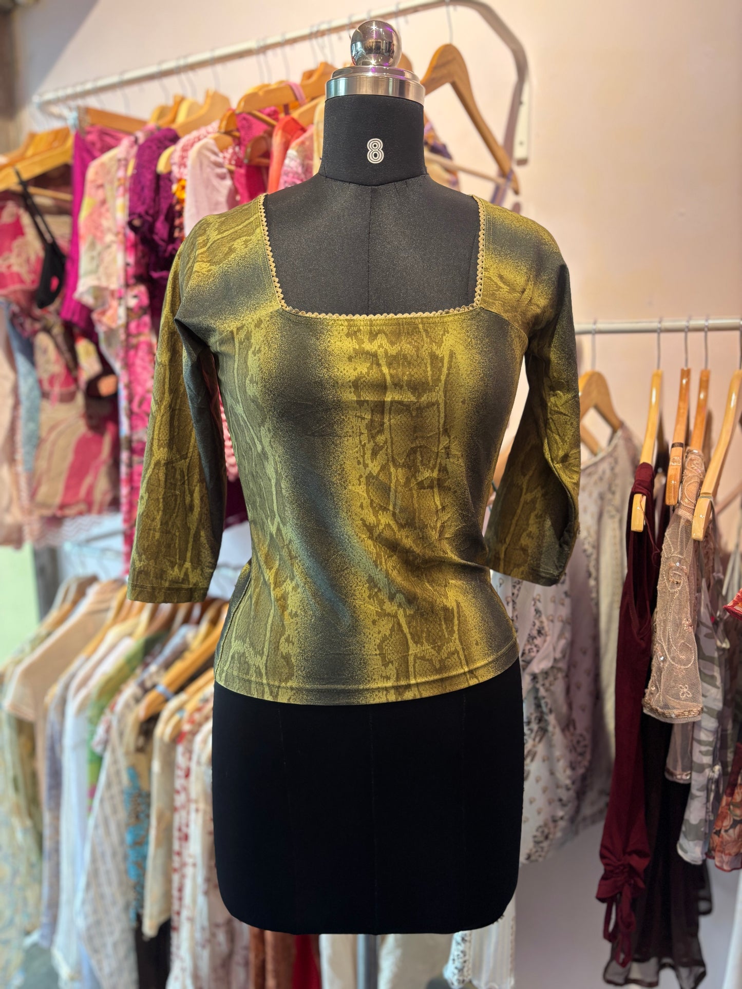 Snake print top with lacy neck
