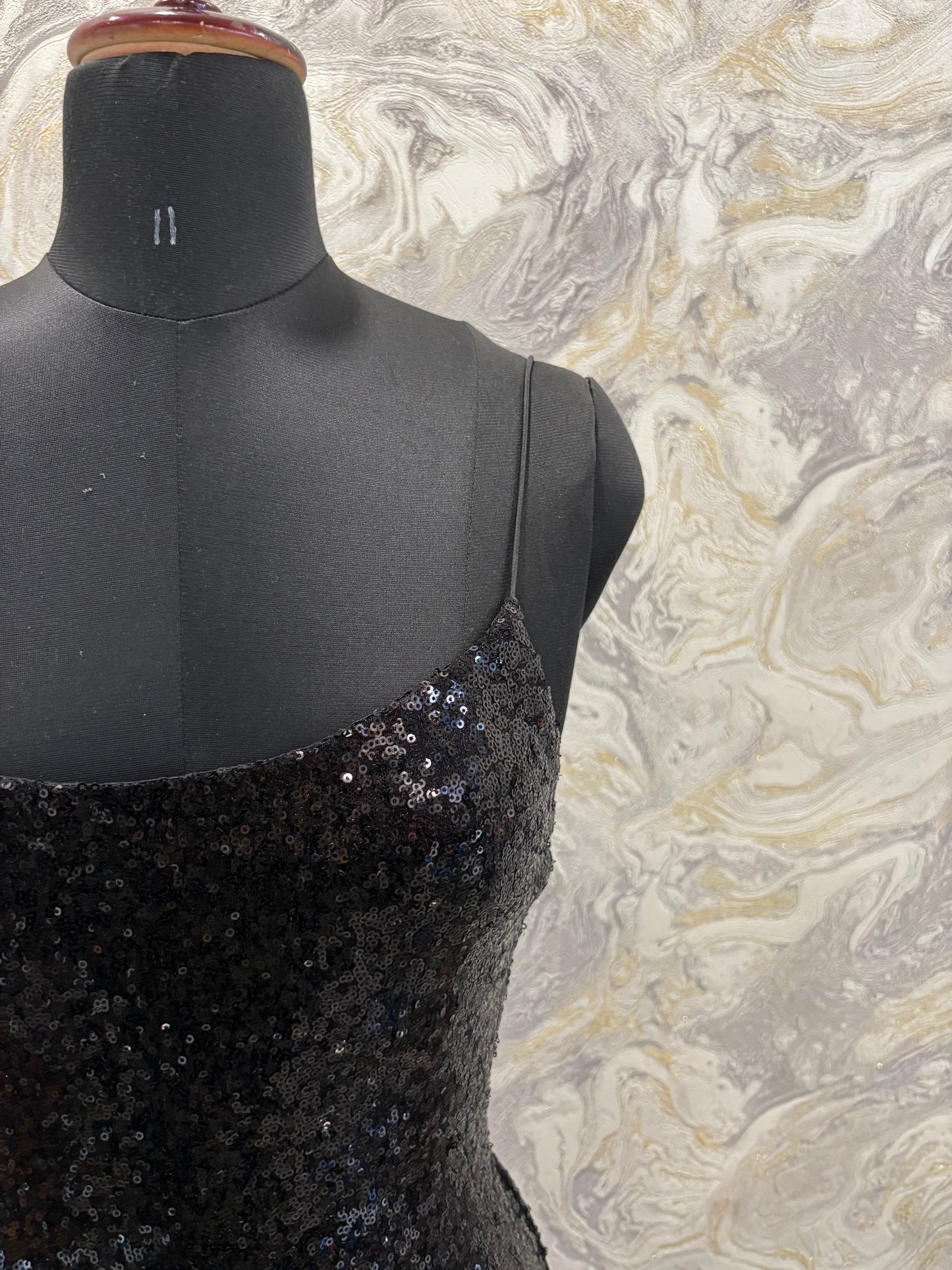 Iconic black sequins dress