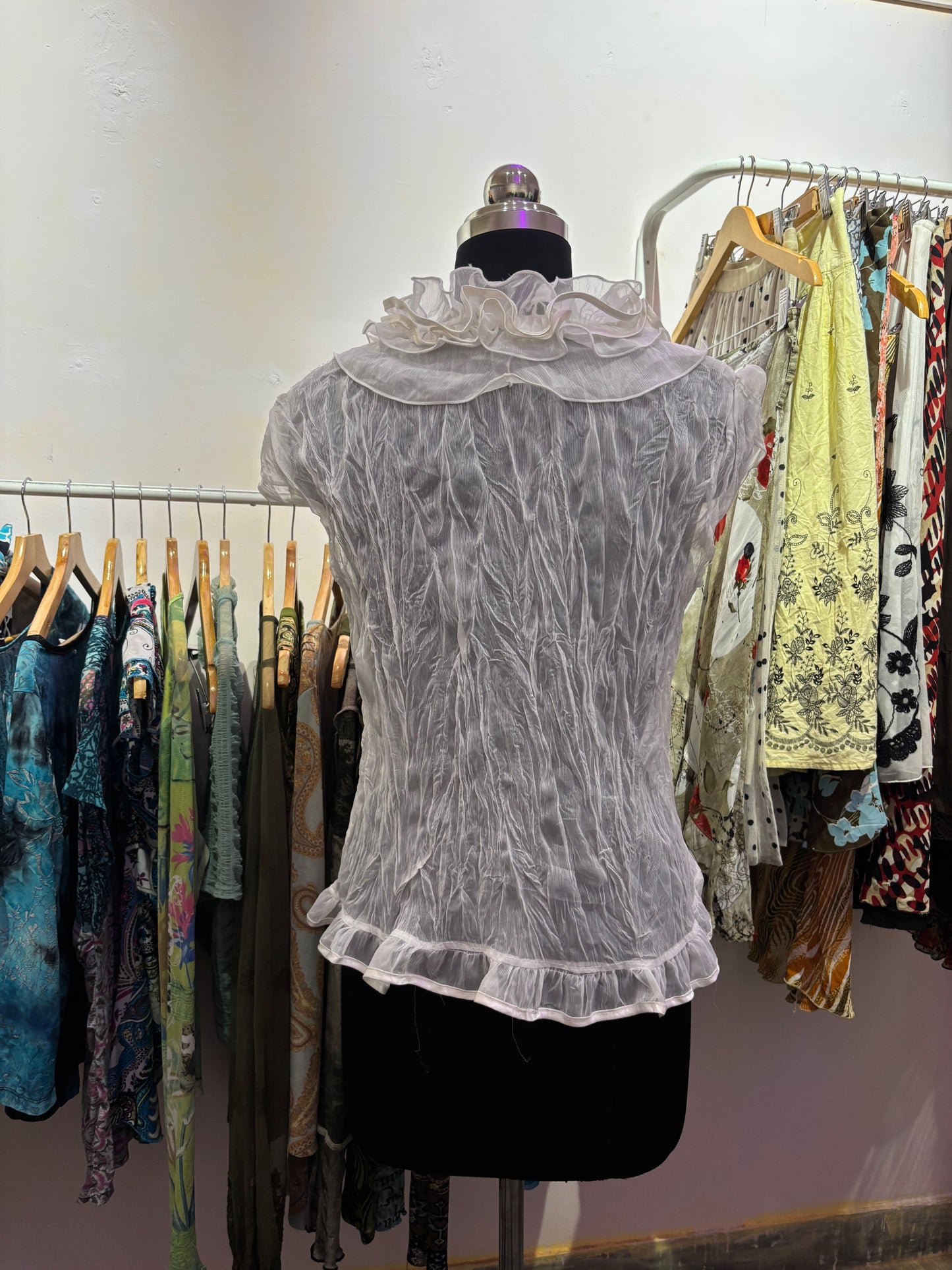 White ruffle neck top