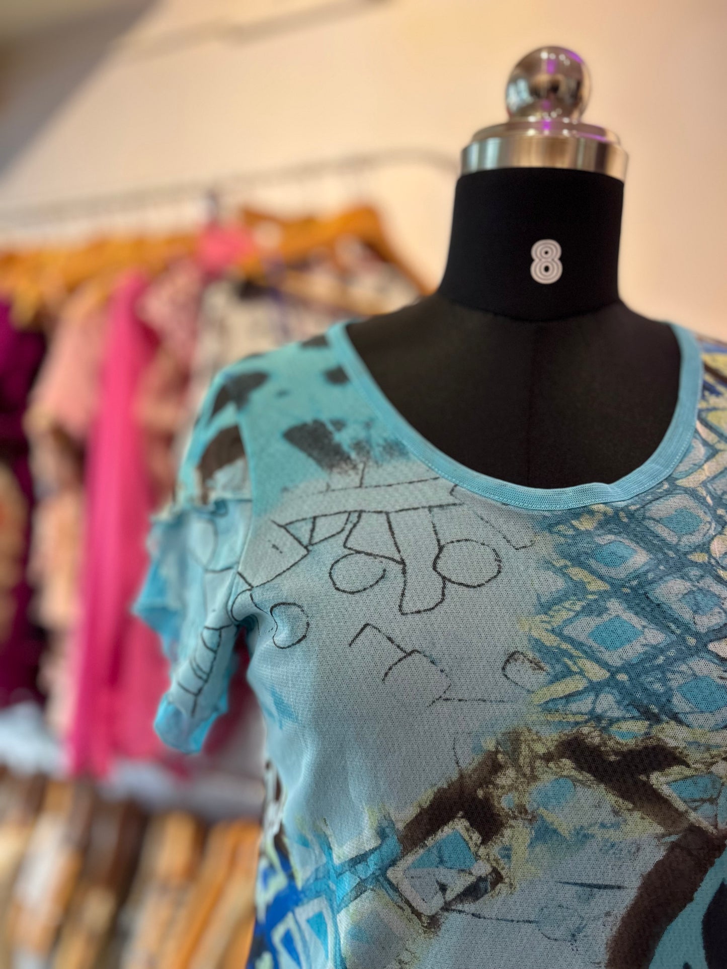 Abstract top