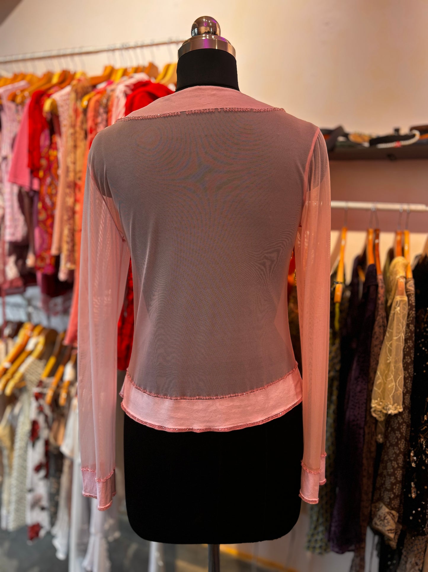 Diana’s pink top