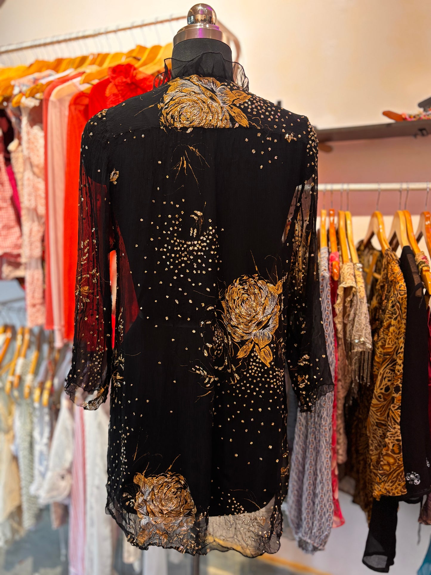 Golden rose silk overwear with Victorian collar.