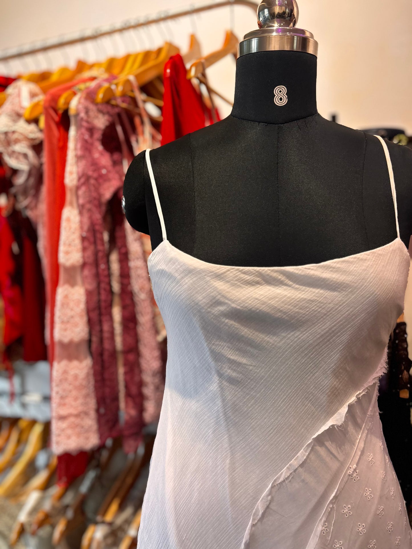 White asymmetrical dress with embroidery