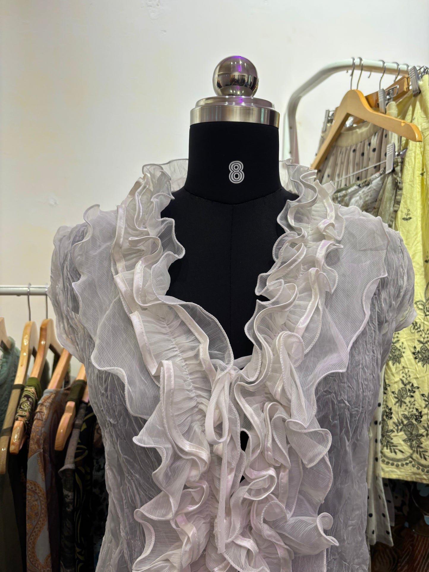 White ruffle neck top