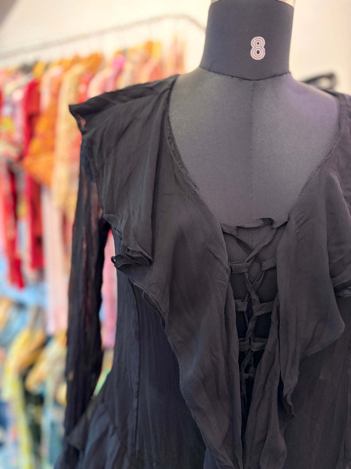 Black ruffles with strings in between