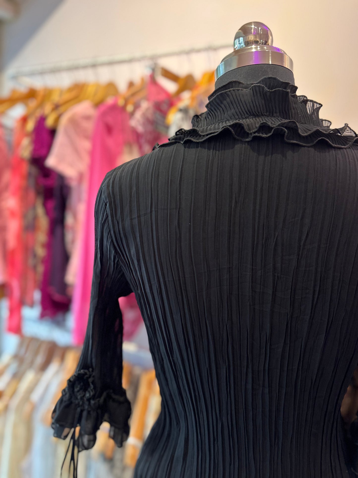 Black ruffle shirt