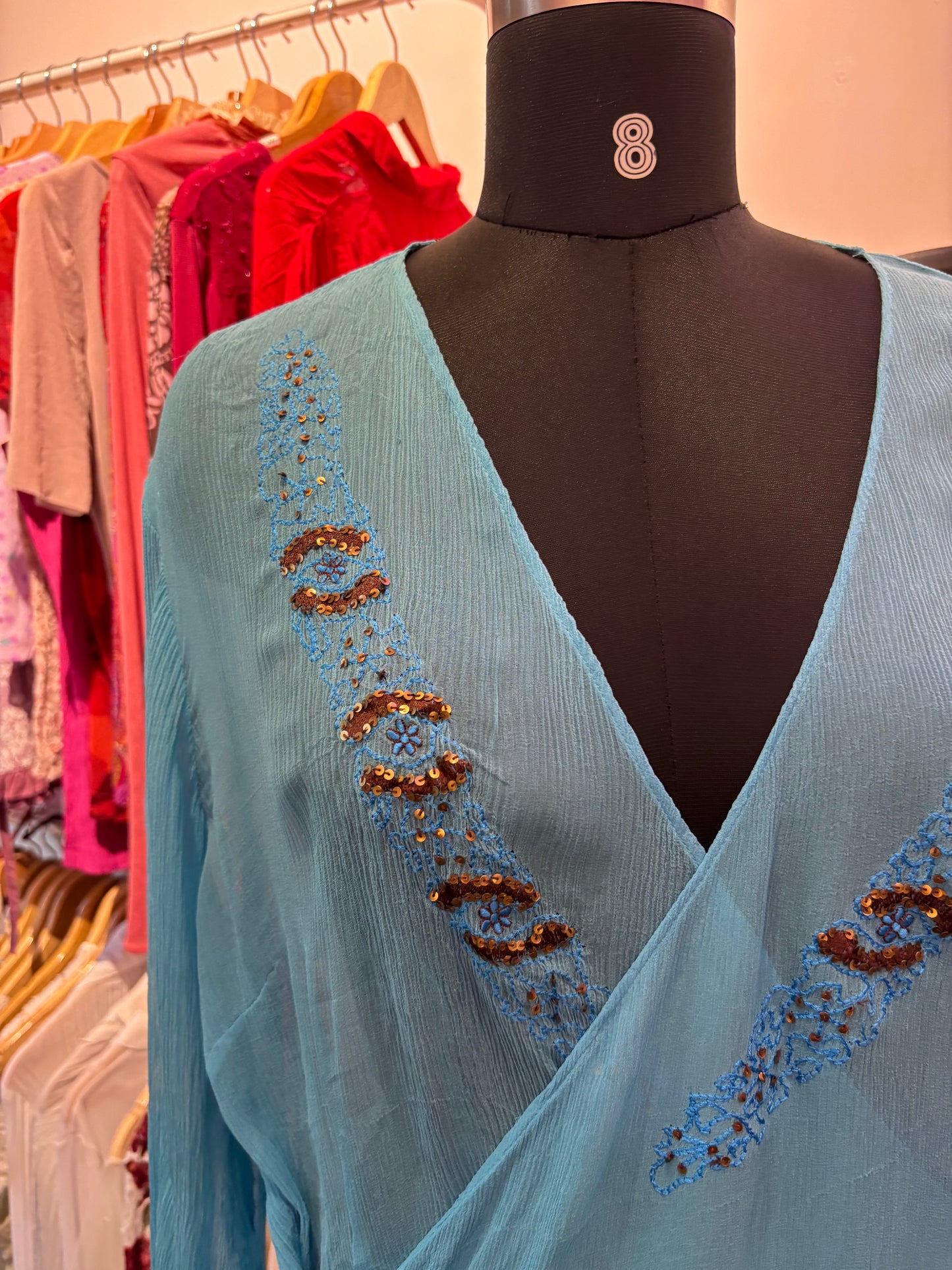 Blue embroidered wrap silk top
