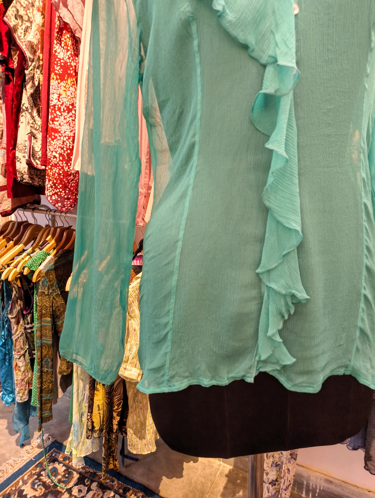 Green 100 percent silk ruffle top