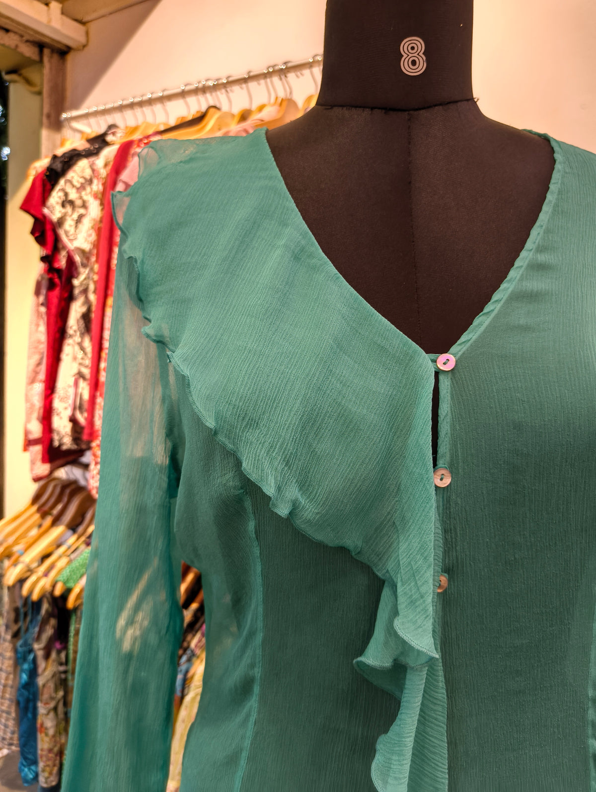 Green 100 percent silk ruffle top